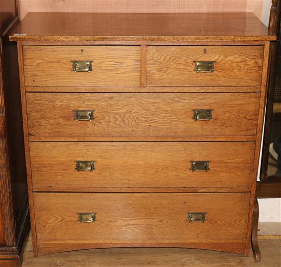 An Edwardian oak chest of drawers, W.107cms